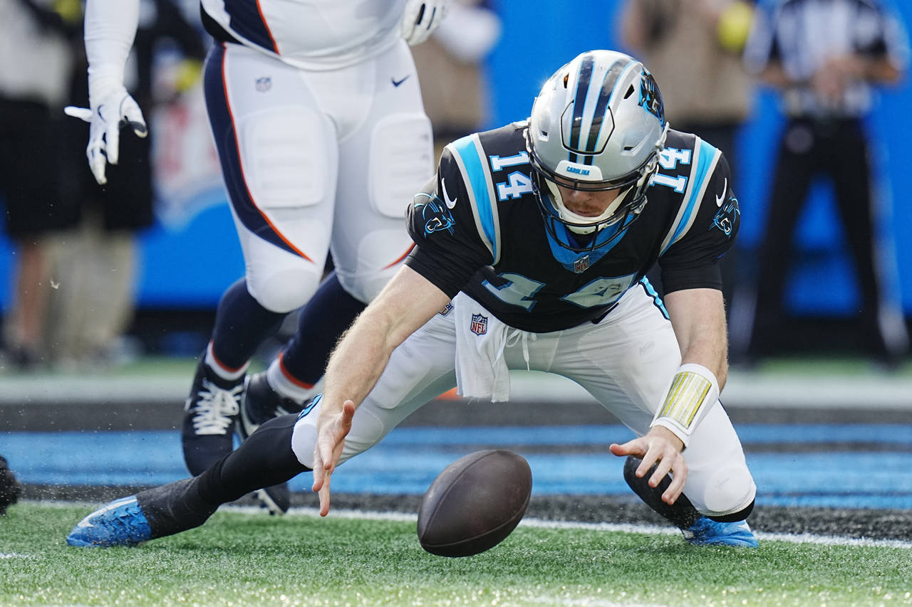 Carolina Panthers quarterback Sam Darnold recovers a fumble for a touchdown during the second half ...