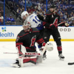 
              Tampa Bay Lightning center Ross Colton (79, right) watches his shot get past Carolina Hurricanes goaltender Frederik Andersen (31) for a goal during the second period of an NHL hockey game Thursday, Nov. 3, 2022, in Tampa, Fla. (AP Photo/Chris O'Meara)
            