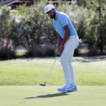 
              Tony Finau sinks a putt on the ninth green for birdie during the second round of the Houston Open golf tournament Friday, Nov. 11, 2022, in Houston. (AP Photo/Michael Wyke)
            