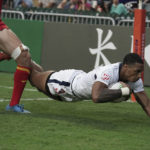
              David Still of United States scores a try against Spain during the first day of the Hong Kong Sevens rugby tournament in Hong Kong, Friday, Nov. 4, 2022. The Hong Kong Sevens, a popular stop on the World Rugby Sevens Series circuit, is part of the government's drive to restore the city's image as a vibrant financial hub after it scrapped mandatory hotel quarantine for travelers. (AP Photo/Anthony Kwan)
            