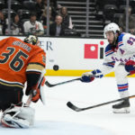 
              Anaheim Ducks goaltender John Gibson stops a shot by New York Rangers' Mika Zibanejad during the second period of an NHL hockey game Wednesday, Nov. 23, 2022, in Anaheim, Calif. (AP Photo/Jae C. Hong)
            