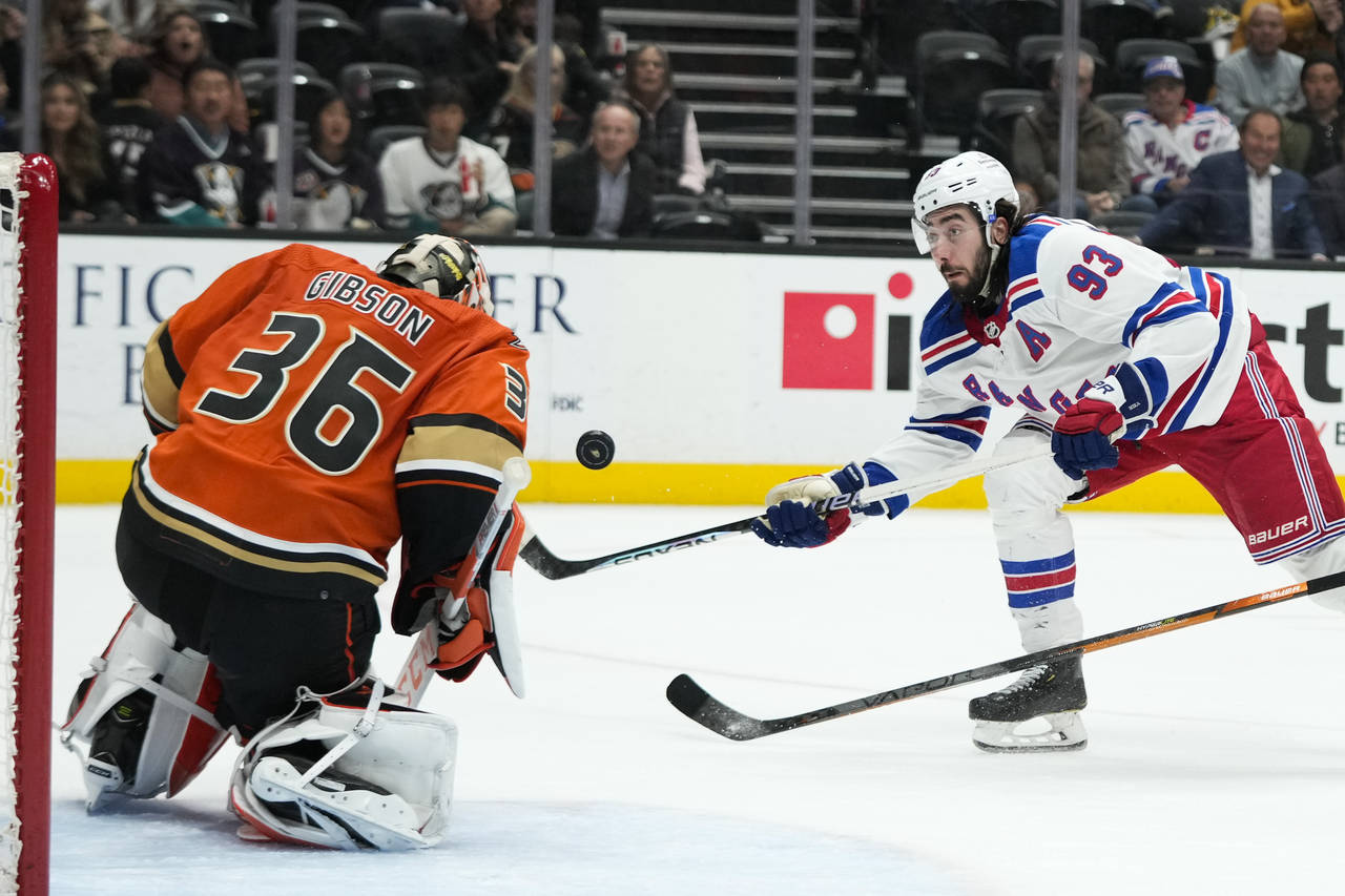 Anaheim Ducks goaltender John Gibson stops a shot by New York Rangers' Mika Zibanejad during the se...