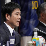 
              Japan national team head coach Hajime Moriyasu, left, announces the national team members for FIFA World Cup 2022 Tuesday, Nov. 1, 2022, in Tokyo. (AP Photo/Eugene Hoshiko)
            