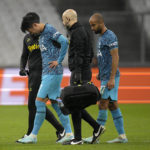 
              Tottenham's Son Heung-min leaves the field injured during the Champions League Group D soccer match between Marseille and Tottenham Hotspur at the Stade Velodrome in Marseille, France, Tuesday, Nov. 1, 2022. (AP Photo/Daniel Cole)
            