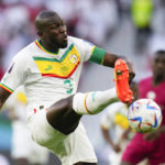 
              Senegal's Kalidou Koulibaly fires a shot during a World Cup group A soccer match against Qatar at the Al Thumama Stadium in Doha, Qatar, Friday, Nov. 25, 2022. (AP Photo/Petr Josek)
            