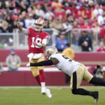 
              San Francisco 49ers quarterback Jimmy Garoppolo (10) passes against New Orleans Saints defensive end Malcolm Roach during the second half of an NFL football game in Santa Clara, Calif., Sunday, Nov. 27, 2022. (AP Photo/Godofredo A. Vásquez)
            