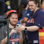 
              Fans wait for a victory parade for the Houston Astros' World Series baseball championship Monday, Nov. 7, 2022, in Houston. (AP Photo/David Phillip)
            