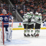 
              Dallas Stars players celebrate after a goal against Edmonton Oilers goalie Jack Campbell, left, during third-period NHL hockey game action in Edmonton, Alberta, Saturday, Nov. 5, 2022. (Jason Franson/The Canadian Press via AP)
            