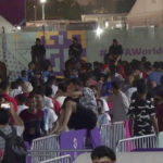 
              In this image from video, Qatari police stand by on horseback as other security officials try to control a crowd at a FIFA Fan Zone ahead of the World Cup in Doha, Qatar, Saturday, Nov. 19, 2022. Authorities turned away thousands of fans Saturday night from a concert celebrating the World Cup beginning the next day in Qatar, revealing the challenges ahead for Doha as it tries to manage crowds in FIFA's most-compact tournament ever. (AP Photo/Srdjan Nedeljkovic)
            