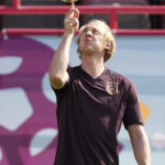 
              Germany's Julian Brandt juggles a ball prior to a training session at the Al-Shamal stadium on the eve of the group E World Cup soccer match between Germany and Japan, in Al-Ruwais, Qatar, Tuesday, Nov. 22, 2022. Germany will play the first match against Japan on Wednesday, Nov. 23. (AP Photo/Matthias Schrader)
            