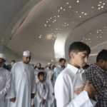 
              FILE - People perform Friday Prayers at the Qatar Faculty of Islamic Studies's mosque, in Doha, Qatar, Friday, April 26, 2019. (AP Photo/Kamran Jebreili, File)
            