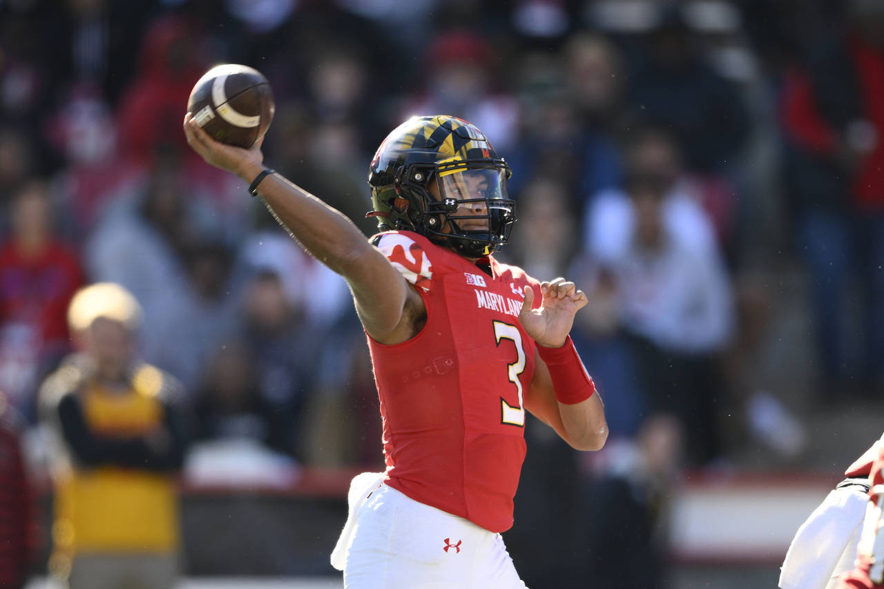 Maryland quarterback Taulia Tagovailoa (3) passes during the first half of an NCAA college football...