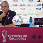 
              Australia's head coach Graham Arnold, left, and Player Mathew Ryan listen to a reporter during a press conference on the eve of the group D World Cup soccer match between France and Australia, in Doha, Qatar, Monday, Nov. 21, 2022. (AP Photo/Ariel Schalit)
            