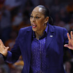 
              FILE - Then-Buffalo head coach Felisha Legette-Jack reacts to a call during the first half of a college basketball game against Tennessee in the first round of an NCAA college basketball tournament, Saturday, March 19, 2022, in Knoxville, Tenn. Legette-Jack  is now the coach at Syracuse.  The Atlantic Coast and Southeastern conferences have led the way among the power conferences in hiring coaches of color to lead women’s basketball programs. (AP Photo/Wade Payne, Fle)
            