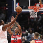 
              Brooklyn Nets forward Kevin Durant (7) goes to the basket against Washington Wizards forward Kyle Kuzma (33) during the first half of an NBA basketball game Friday, Nov. 4, 2022, in Washington. (AP Photo/Nick Wass)
            