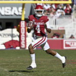 
              Arkansas quarterback Malik Hornsby (4) runs out of the pocket against LSU during the first half of an NCAA college football game Saturday, Nov. 12, 2022, in Fayetteville, Ark. (AP Photo/Michael Woods)
            