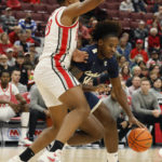 
              Charleston Southern's Taje Kelly, right, drives to the basket against Ohio State's Zed Key during the first half of an NCAA college basketball game Thursday, Nov. 10, 2022, in Columbus, Ohio. (AP Photo/Jay LaPrete)
            