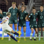 
              U.S. forward Megan Rapinoe (15) takes a kick during the second half of an international friendly soccer match against Germany, Thursday, Nov. 10, 2022, in Fort Lauderdale, Fla. Germany won 2-1. (AP Photo/Lynne Sladky)
            