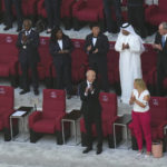 
              FIFA President Gianni Infantino, left, looks on as German Football Federation (DFB) President Bernd Neuendorf, centre, talks to German Interior Minister Nancy Faeser, second right, wearing the One Love armband on the tribune prior to the World Cup group E soccer match between Germany and Japan, at the Khalifa International Stadium in Doha, Qatar, Wednesday, Nov. 23, 2022. (AP Photo/Petr Josek)
            