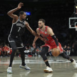 
              Chicago Bulls guard Zach LaVine (8) drives against Brooklyn Nets forward Kevin Durant (7) during the first half of an NBA basketball game Tuesday, Nov. 1, 2022, in New York. (AP Photo/Jessie Alcheh)
            