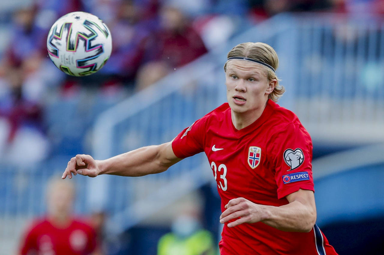 FILE - Norway's Erling Haaland controls the ball during a World Cup 2022 group G qualifying soccer ...