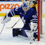 
              Toronto Maple Leafs goaltender Erik Kallgren makes a save against the Pittsburgh Penguins during the first period of an NHL hockey game Friday, Nov. 11, 2022, in Toronto. (Frank Gunn/The Canadian Press via AP)
            