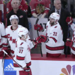 
              Carolina Hurricanes' Andrei Svechnikov (37) celebrates his goal with teammates during the second period of an NHL hockey game against the Chicago Blackhawks, Monday, Nov. 14, 2022, in Chicago. (AP Photo/Charles Rex Arbogast)
            