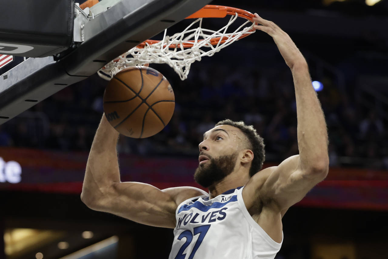 Minnesota Timberwolves center Rudy Gobert dunks against the Orlando Magic during the first half of ...