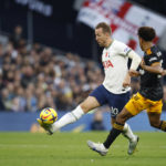 
              Tottenham's Harry Kane, left, duels for the ball with Leeds United's Tyler Adams during the English Premier League soccer match between Tottenham Hotspur and Leeds United at Tottenham Hotspur Stadium in London, Saturday, Nov. 12, 2022. (AP Photo/David Cliff)
            