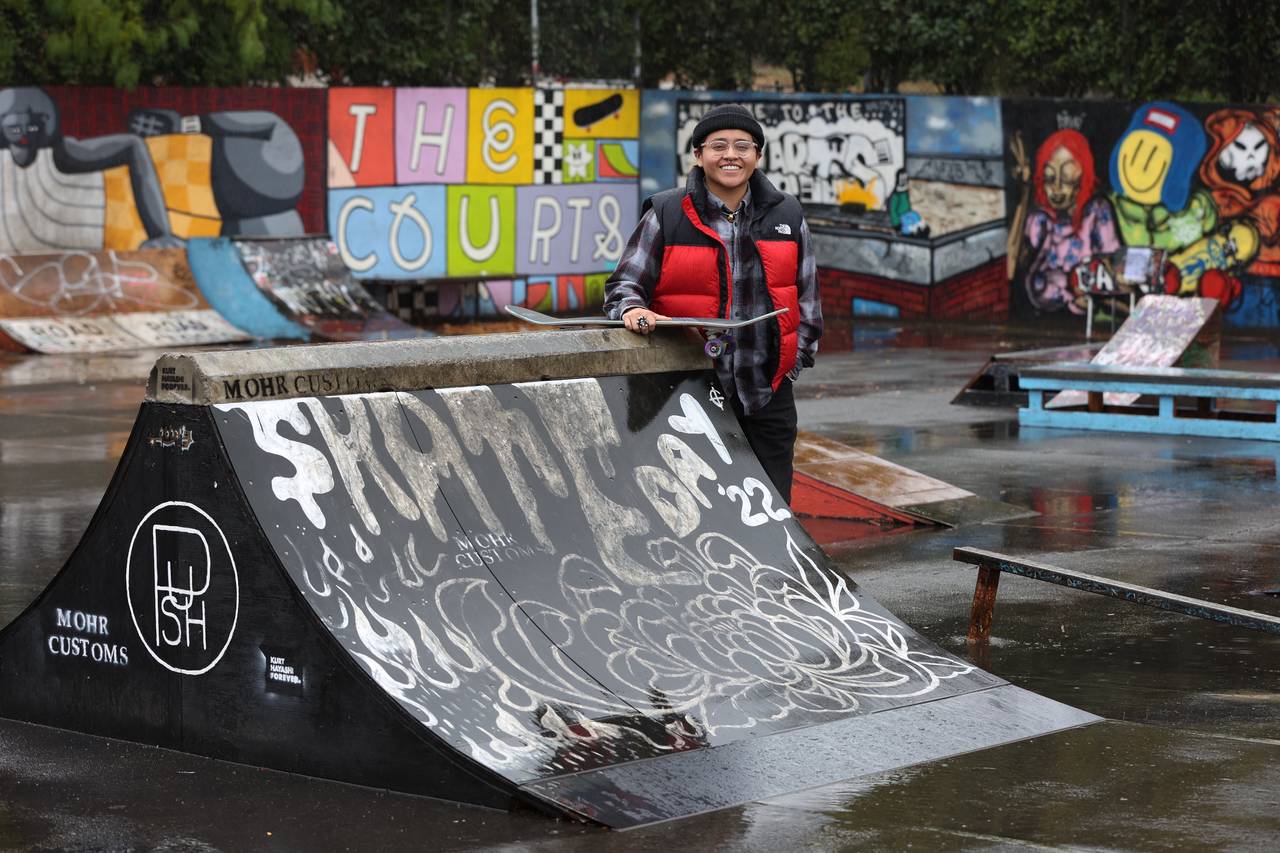 Sara Campos poses at tennis courts being converted to a skatepark at Portland State University in P...