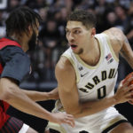 
              Purdue Boilermakers forward Mason Gillis (0) drives to the basket during an NCAA college basketball game, Friday, Nov. 11, 2022, in West Lafayette, Ind. (Alex Martin/Journal & Courier via AP)
            