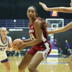 
              Stanford forward Kiki Iriafen (44) makes a move to the basket against Portland forward Lucy Cochrane, right, during the second half of an NCAA college basketball game in Portland, Ore., Sunday, Nov. 13, 2022. (AP Photo/Troy Wayrynen)
            