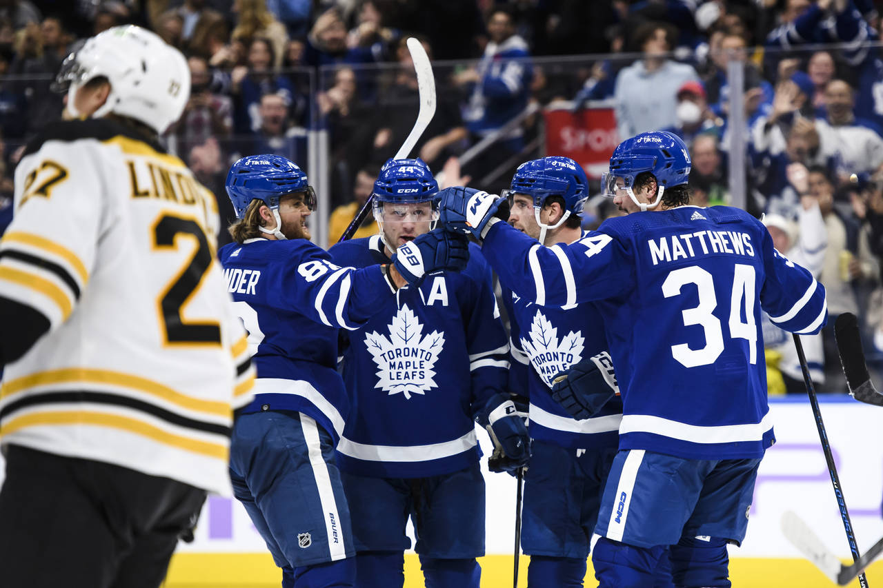 Toronto Maple Leafs celebrate after forward Auston Matthews (34) scored against the Boston Bruins d...
