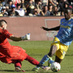 
              Los Angeles FC goalkeeper Maxime Crépeau (16) collides with Philadelphia Union forward Cory Burke (19) in the extra time during the MLS Cup soccer match Saturday, Nov. 5, 2022, in Los Angeles. (AP Photo/Marcio Jose Sanchez)
            