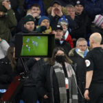 
              file - Referee Anthony Taylor checks the VAR screen during the English Premier League soccer match between Manchester City and Tottenham Hotspur, at the Etihad stadium in Manchester, England, Saturday, Feb. 19, 2022. VAR's World Cup debut came in 2018 but referees and players are still getting to grips with the technology four years ago. Human error is still there with decisions open to interpretation however many times a referees goes over to the pitch-side monitor to watch replays. (AP Photo/Jon Super, File)
            