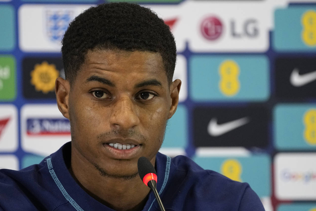 England's Marcus Rashford speaks to the media during a press conference at at Al Wakrah Sports Comp...