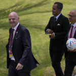 
              FIFA President Gianni Infantino, left, walks during the G20 Summit at the Nusa Dua, Bali, Indonesia on Tuesday, Nov. 15, 2022. (AP Photo/Achmad Ibrahim, Pool)
            