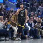 
              Golden State Warriors guard Stephen Curry (30) gestures after shooting a 3-point basket during the first half of the team's NBA basketball game against the Cleveland Cavaliers in San Francisco, Friday, Nov. 11, 2022. (AP Photo/Jeff Chiu)
            