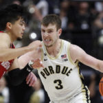 
              Purdue guard Braden Smith (3) drives to the basket against Austin Peay's Carlos Paez during an NCAA college basketball game Friday, Nov. 11, 2022, in West Lafayette, Ind. (Alex Martin/Journal & Courier via AP)
            