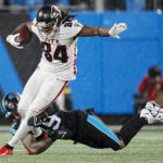 
              Atlanta Falcons running back Cordarrelle Patterson is tackled by Carolina Panthers linebacker Frankie Luvu during the second half of an NFL football game on Thursday, Nov. 10, 2022, in Charlotte, N.C. (AP Photo/Rusty Jones)
            