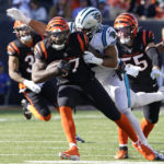 
              Cincinnati Bengals linebacker Germaine Pratt (57) runs with the ball after making an interception against the Carolina Panthers during the first half of an NFL football game, Sunday, Nov. 6, 2022, in Cincinnati. (AP Photo/Joshua A. Bickel)
            