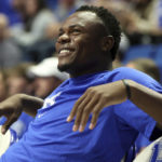 
              Kentucky's injured Oscar Tshiebwe watches from the bench during the second half of the team's NCAA college basketball game against Howard in Lexington, Ky., Monday, Nov. 7, 2022. Kentucky won 95-63. (AP Photo/James Crisp)
            