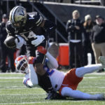 
              Vanderbilt wide receiver Will Sheppard (14) is brought down by Florida safety Rashad Torrence II (22) in the first half of an NCAA college football game Saturday, Nov. 19, 2022, in Nashville, Tenn. (AP Photo/Mark Humphrey)
            