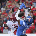 
              Alabama defensive back Terrion Arnold (3) breaks up a pass intended for Mississippi wide receiver Malik Heath (8) during the first half of an NCAA college football game in Oxford, Miss., Saturday, Nov. 12, 2022. (AP Photo/Thomas Graning)
            