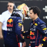 
              Red Bull driver Max Verstappen, of the Netherlands, left, and teammate Sergio Perez, of Mexico, greet each other at the end of the qualifying run of the Formula One Mexico Grand Prix at the Hermanos Rodriguez racetrack in Mexico City, Saturday, Oct. 29, 2022. Verstappen won pole position and Perez cam in fourth. (Carlos Perez Gallardo/Pool via AP)
            