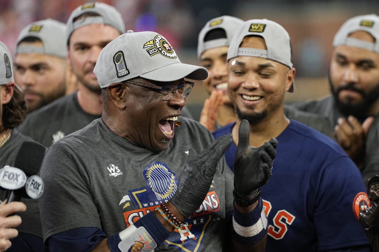Houston Astros manager Dusty Baker Jr., and the Houston Astros celebrate their 4-1 World Series win...