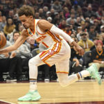 
              Atlanta Hawks guard Trae Young rebounds a shot during the first half of an NBA basketball game against the Cleveland Cavaliers, Monday, Nov. 21, 2022, in Cleveland. (AP Photo/Nick Cammett)
            