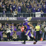 
              Minnesota Vikings wide receiver Justin Jefferson celebrates after catching a 6-yard touchdown pass during the first half of an NFL football game against the New England Patriots, Thursday, Nov. 24, 2022, in Minneapolis. (AP Photo/Andy Clayton-King)
            