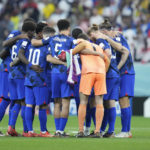 
              United States players prepare before the start of the second half of the World Cup group B soccer match between England and The United States, at the Al Bayt Stadium in Al Khor , Qatar, Friday, Nov. 25, 2022. (AP Photo/Ashley Landis)
            