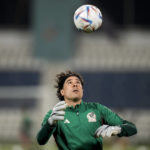 
              Goalkeeper Guillermo Ochoa attends the Mexico official training on the eve of the group C World Cup soccer match between Mexico and Poland, in Jor, Qatar, Monday, Nov. 21, 2022. (AP Photo/Moises Castillo)
            
